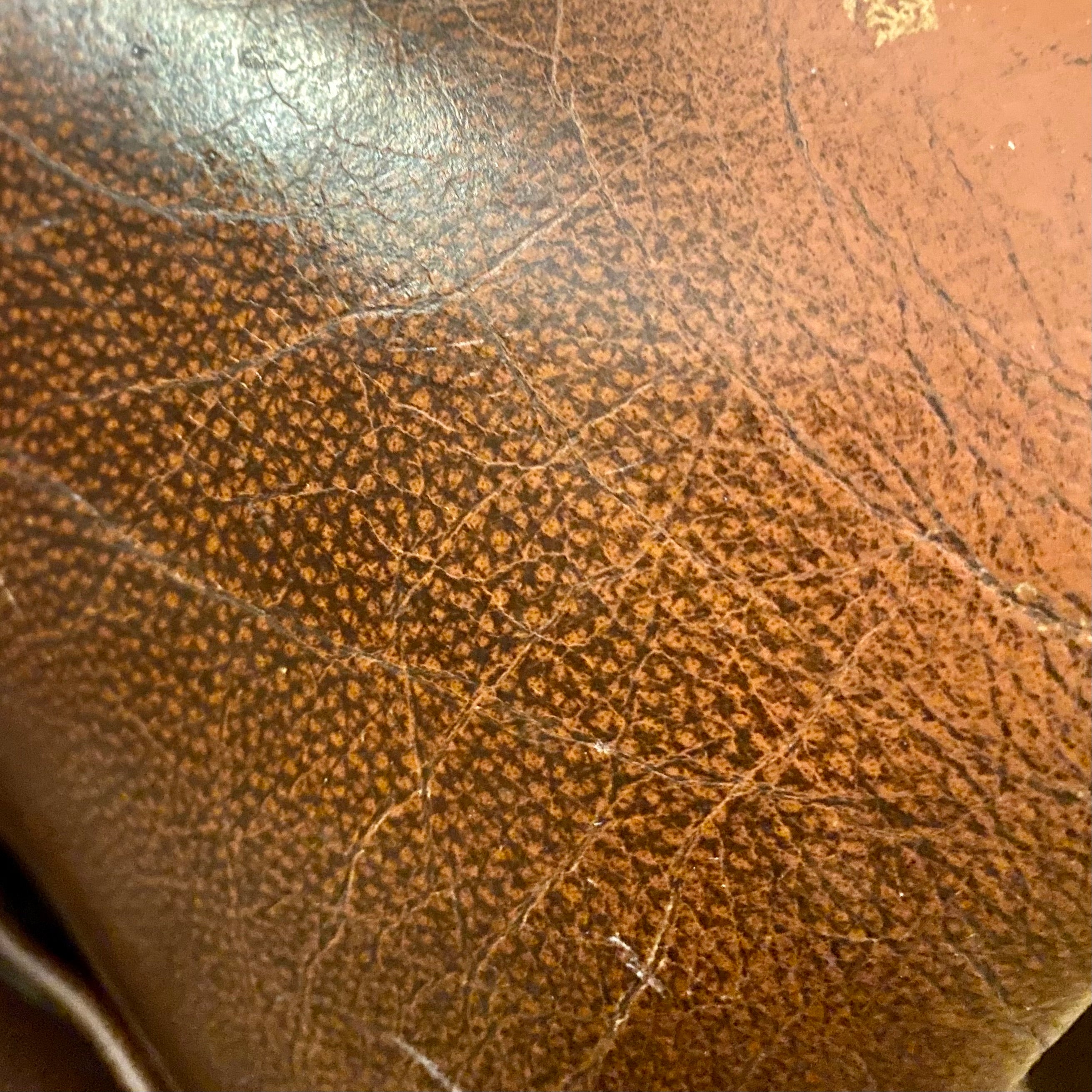 A pair of Dark Leather armchairs - SOLD