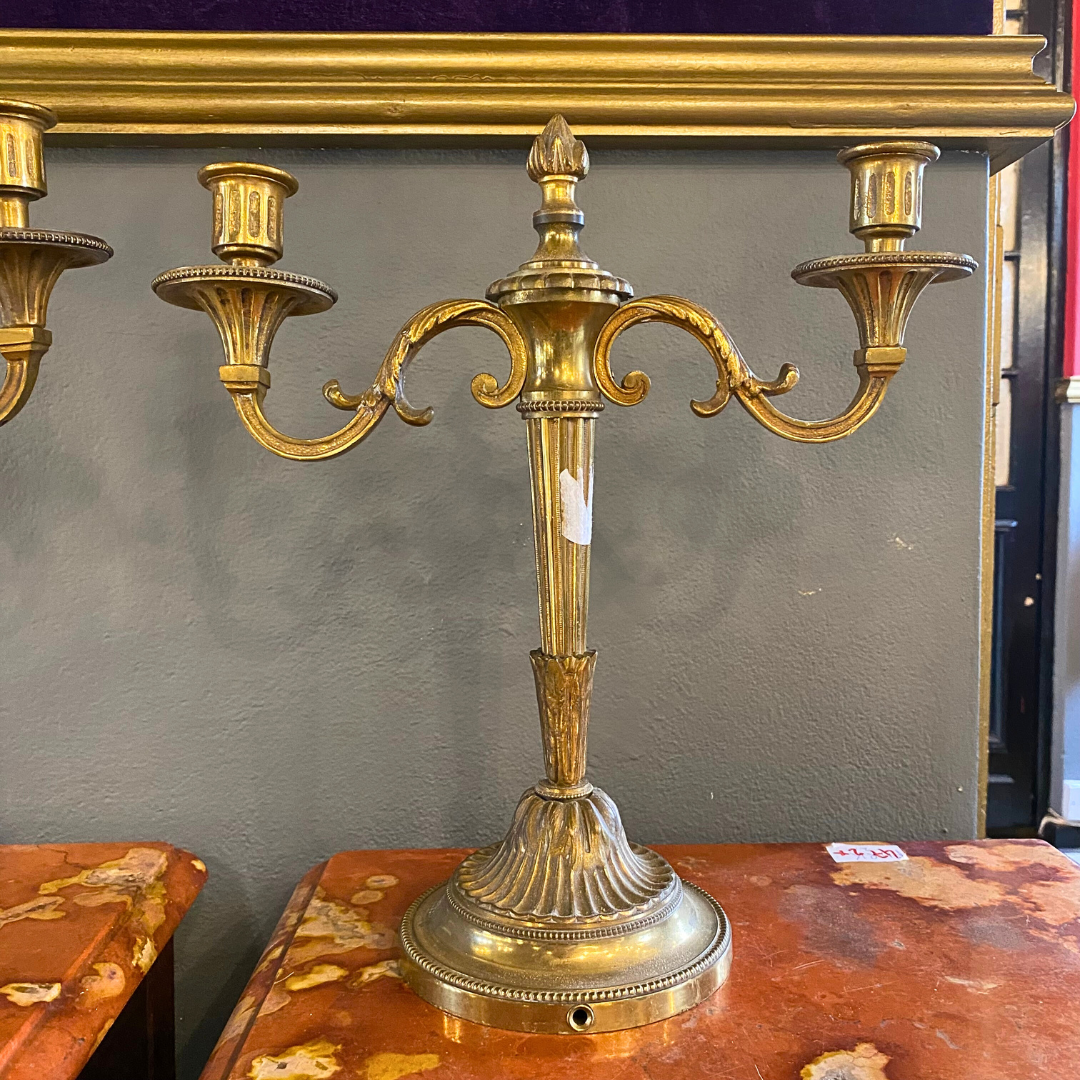 An Antique Pair of Brass Candelabras