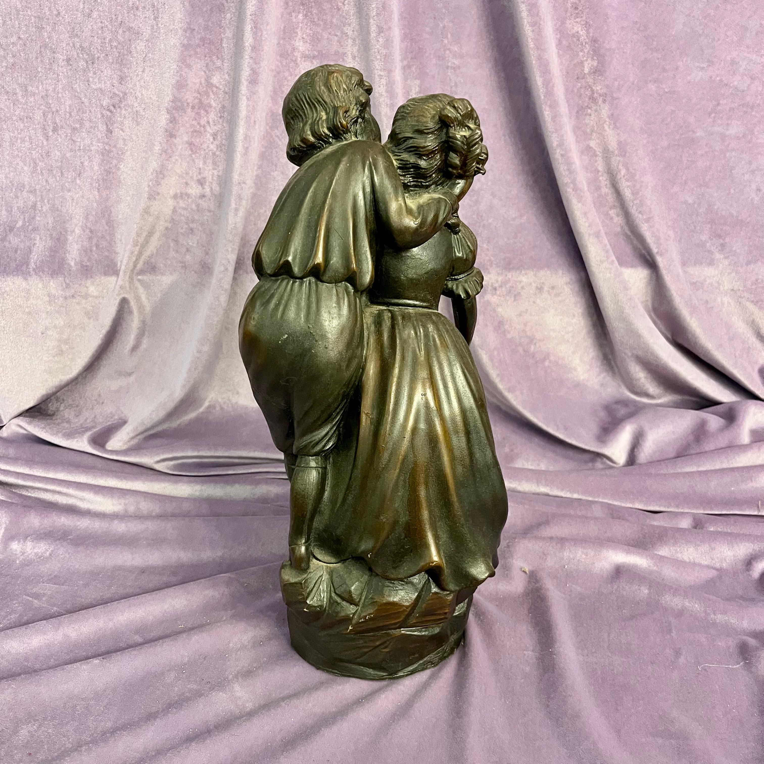 Antique Cast Statuette of Boy Kissing Girl