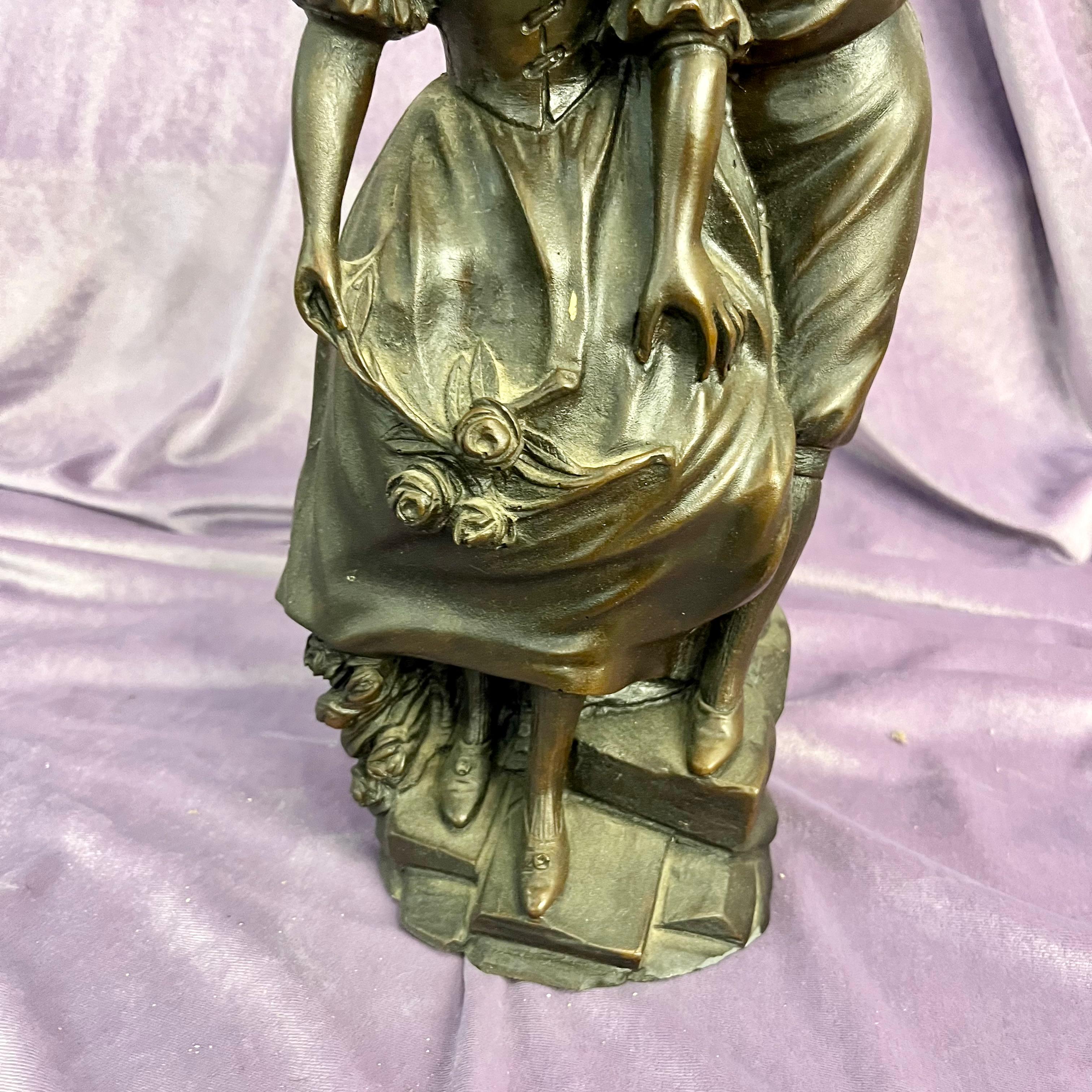 Antique Cast Statuette of Boy Kissing Girl