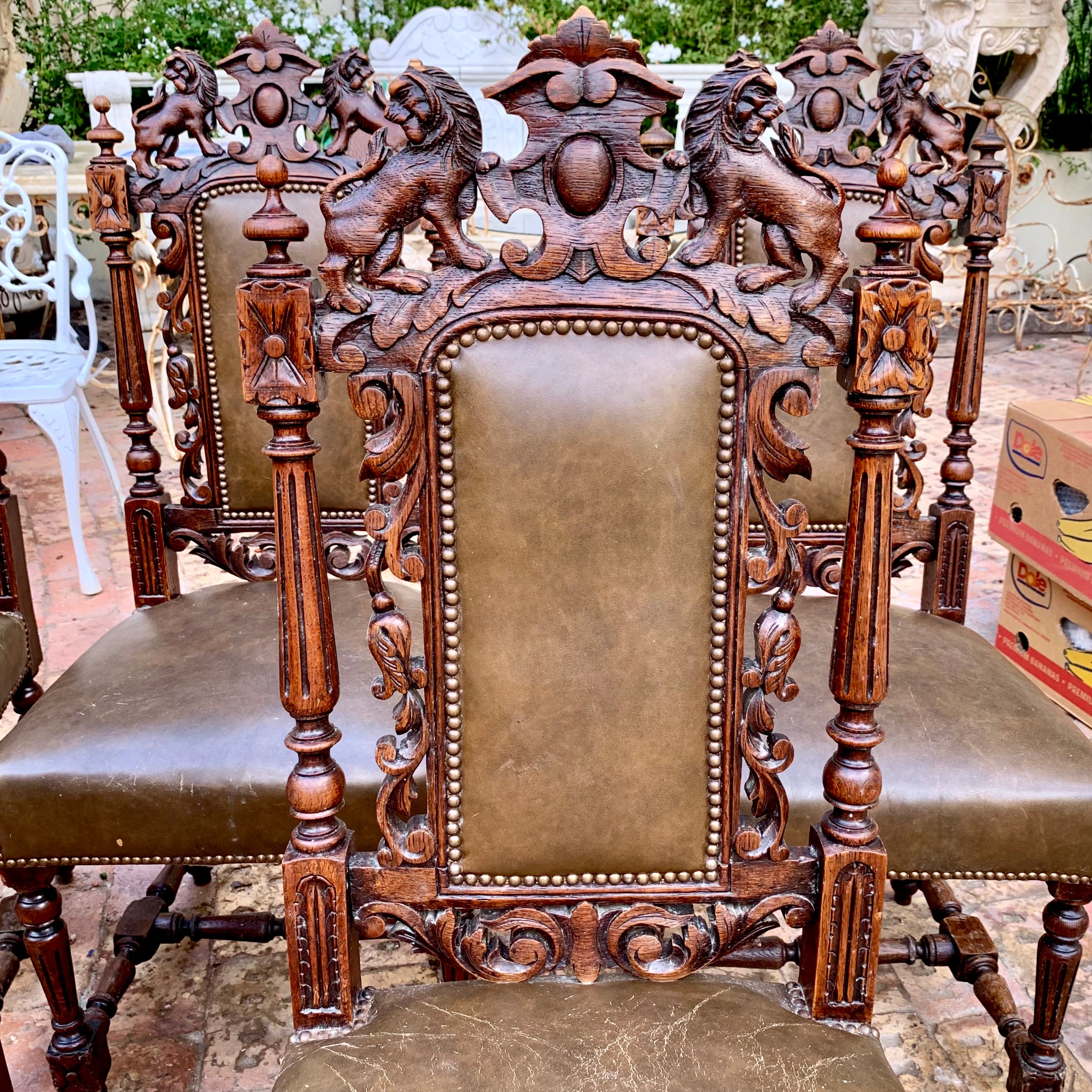 Antique French Carved Dark Oak And Leather Dining Chairs