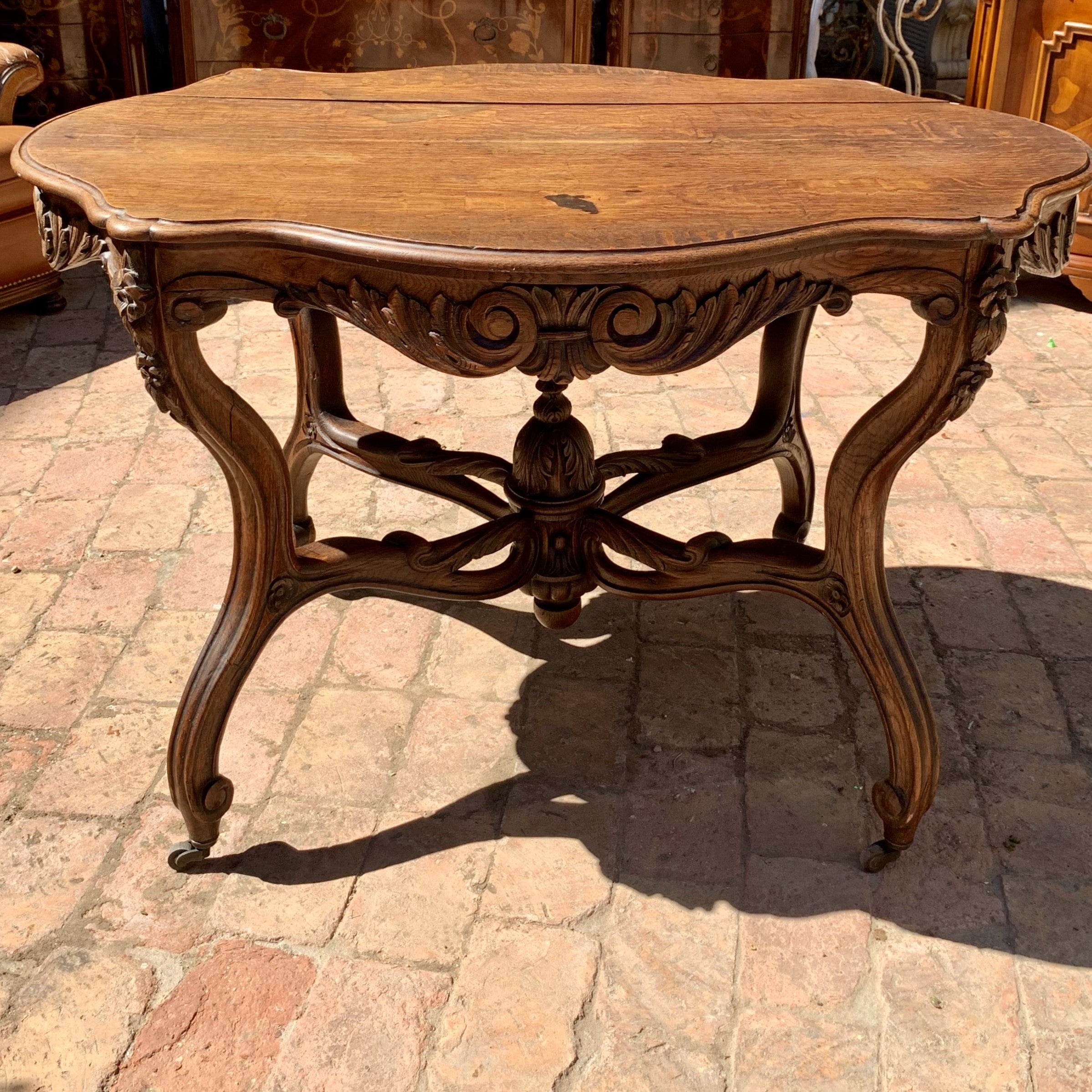 Antique Oak Table with Serpentine Details