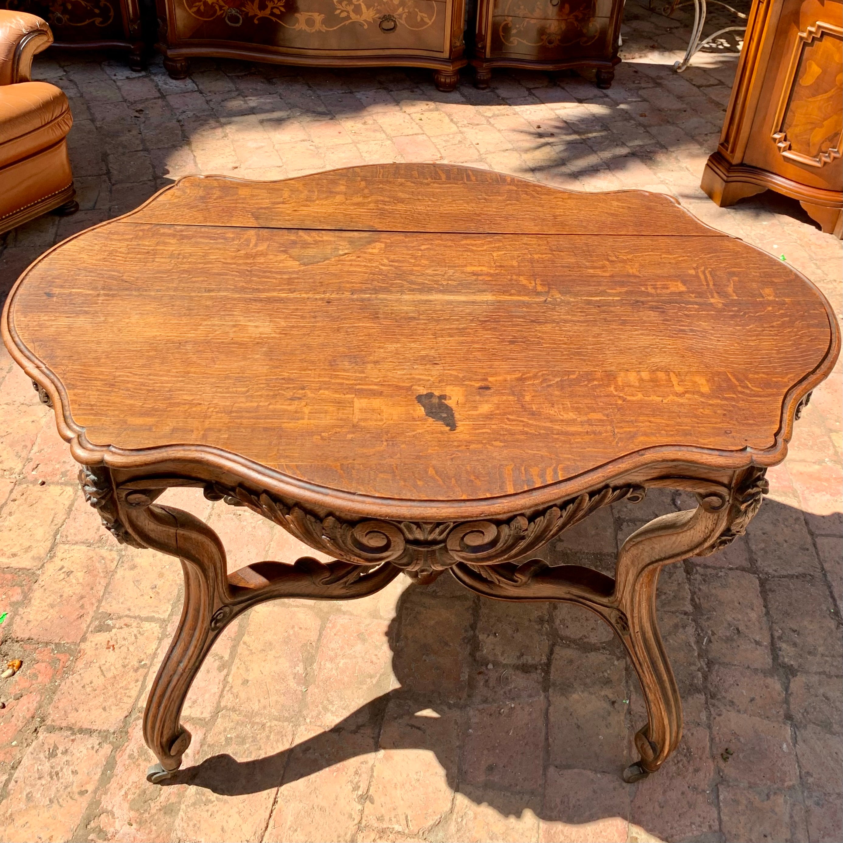 Antique Oak Table with Serpentine Details