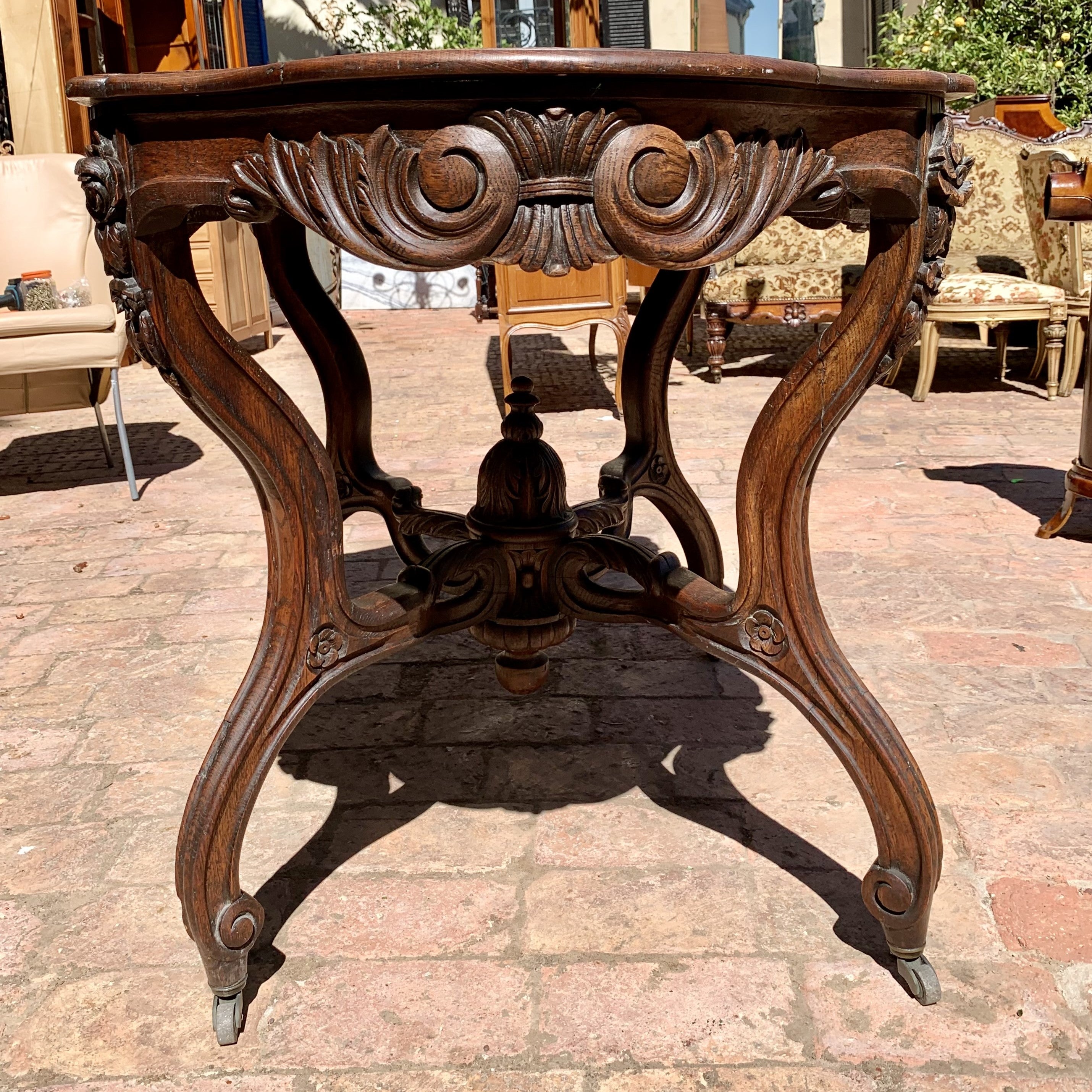 Antique Oak Table with Serpentine Details