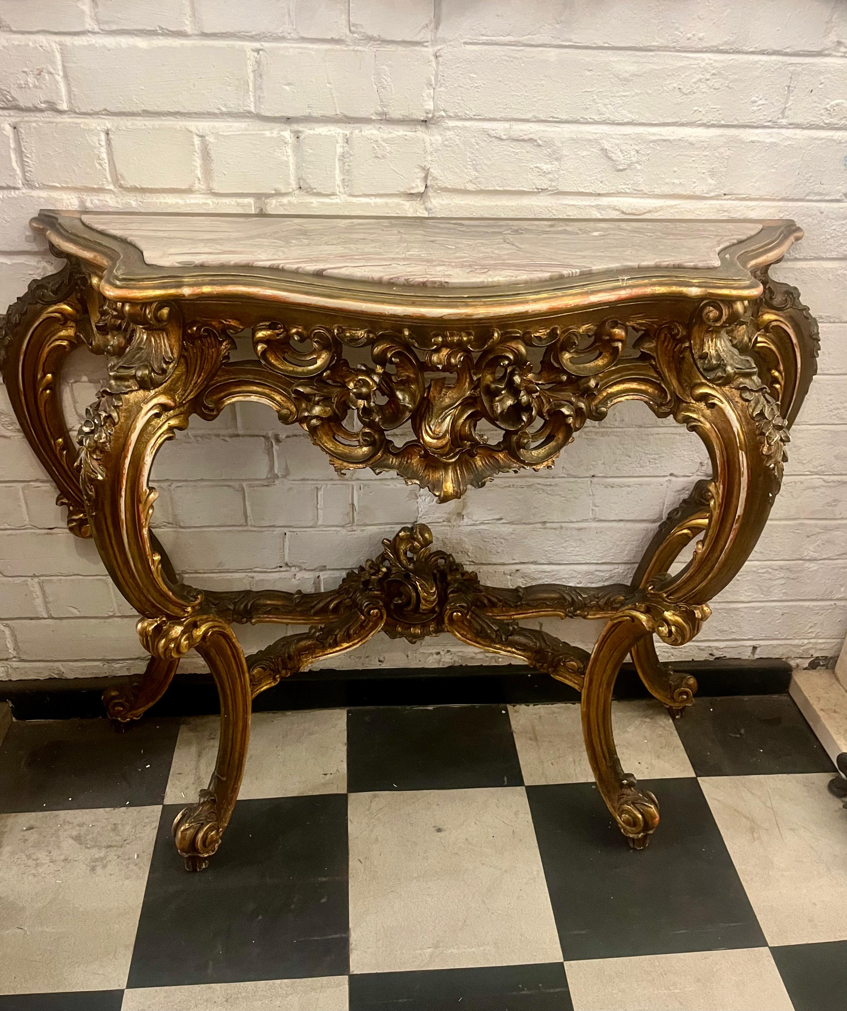 Beautiffuly Carved Gilt Console with Mottled Marble Top - SOLD