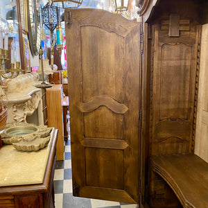 Antique Walnut Armoire with Intricate Carved Details