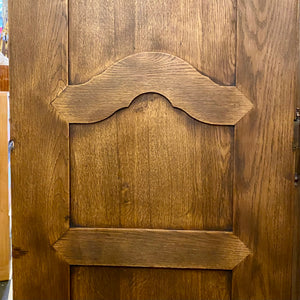 Antique Walnut Armoire with Intricate Carved Details