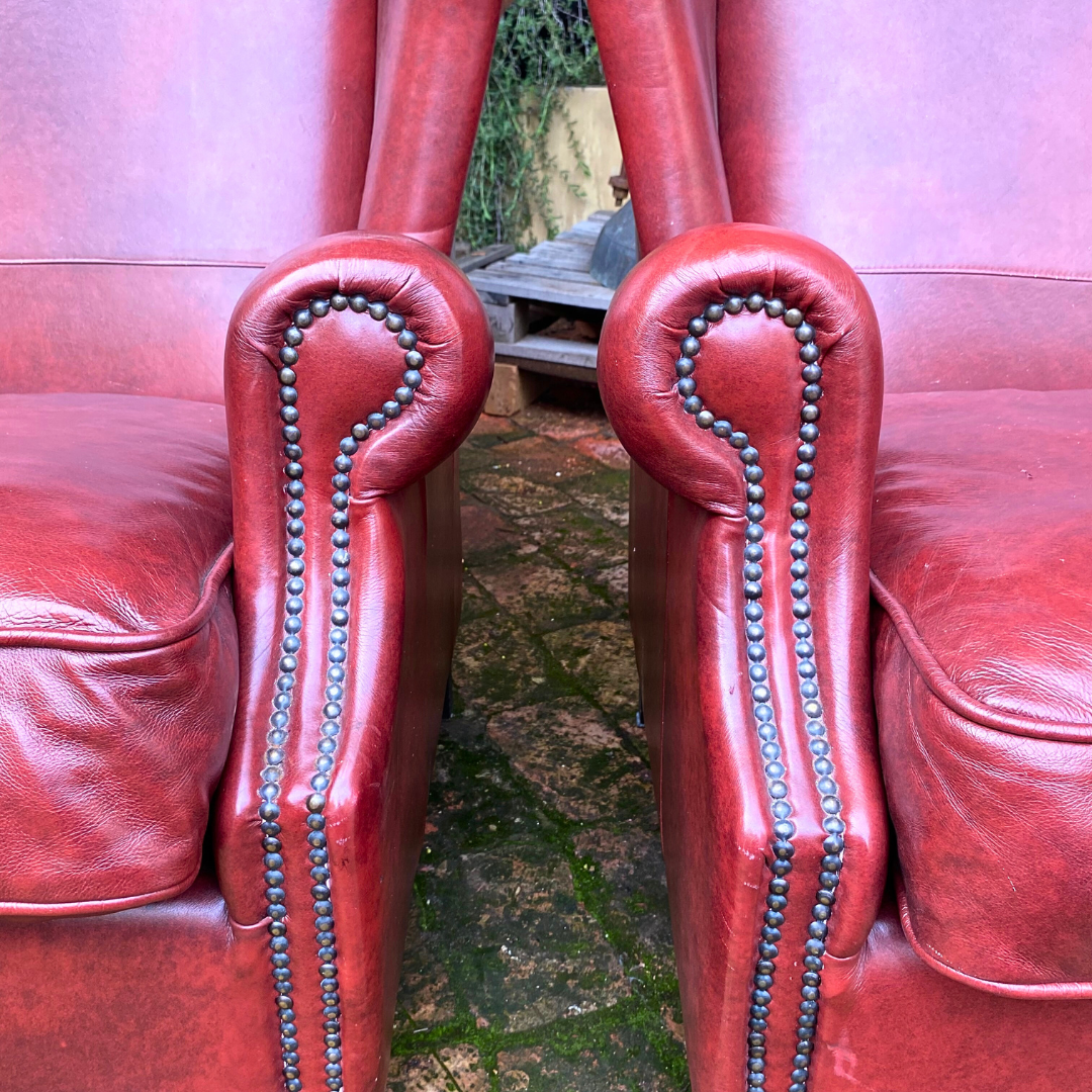 Pair of Burgundy Leather Wingback Armchairs