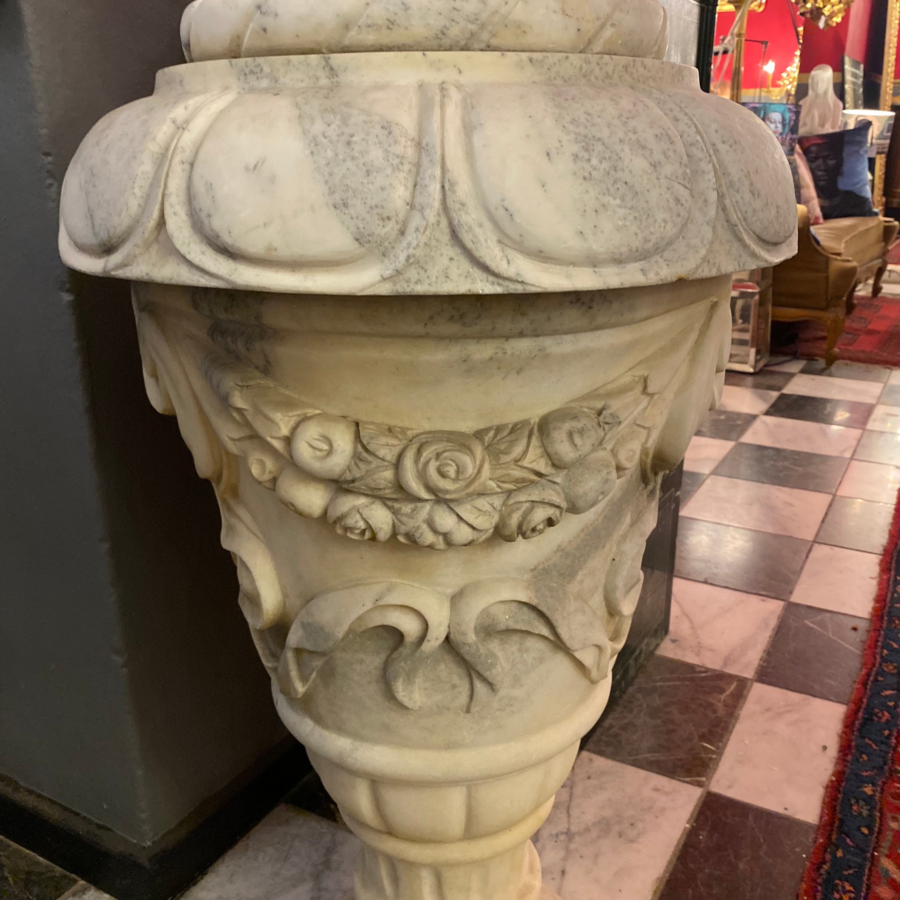 A Pair of Hand Carved White Marble Finials