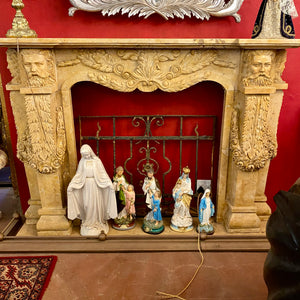 A Very Large and Over the Top Travertine Fireplace Surround