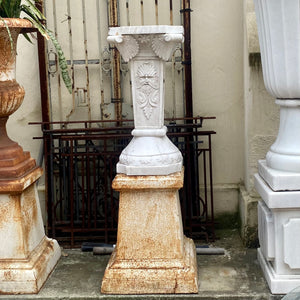 White Marble Plinths with Face of Zeus