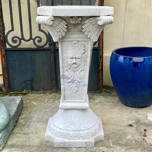 White Marble Plinths with Face of Zeus