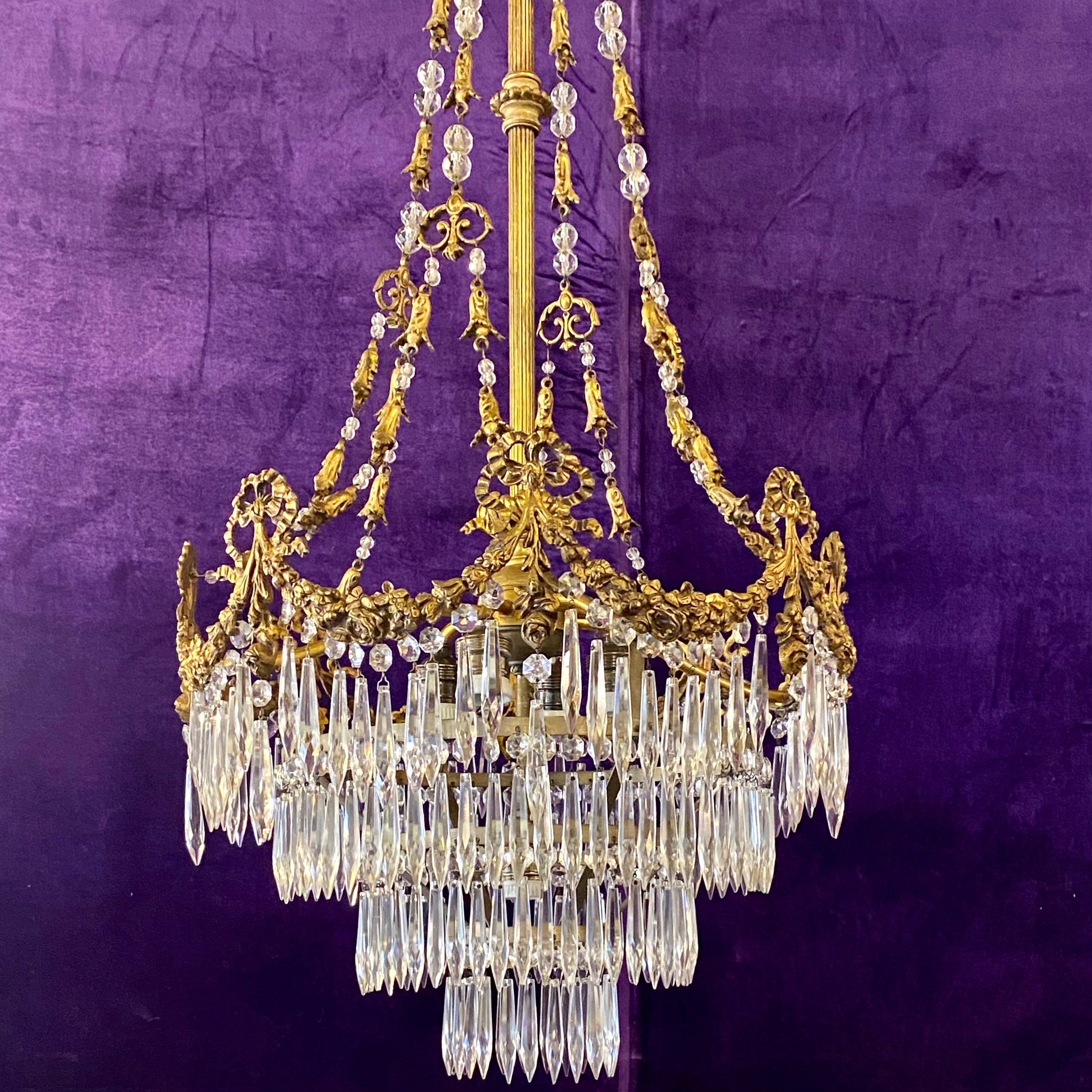 Stunning Empire Era Gilt Brass and Crystal Chandelier