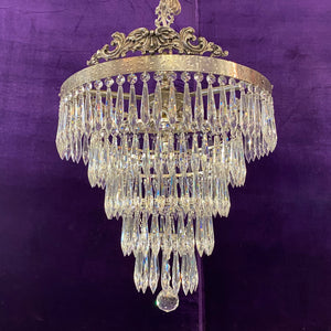 A Nickel and Crystal Waterfall Chandelier – Delos Antiques