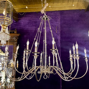 An Extremely Large Nickel Sixteen Arm Chandelier