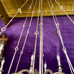 An Extremely Large Nickel Sixteen Arm Chandelier