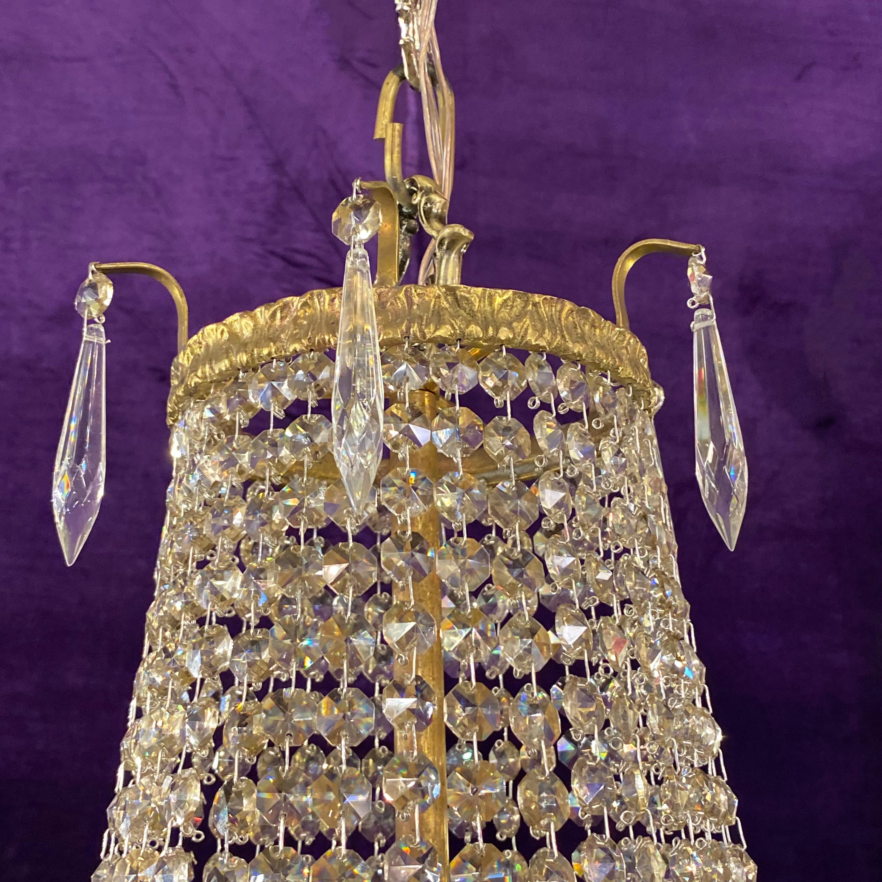 Aged Brass and Crystal Neoclassical Chandelier